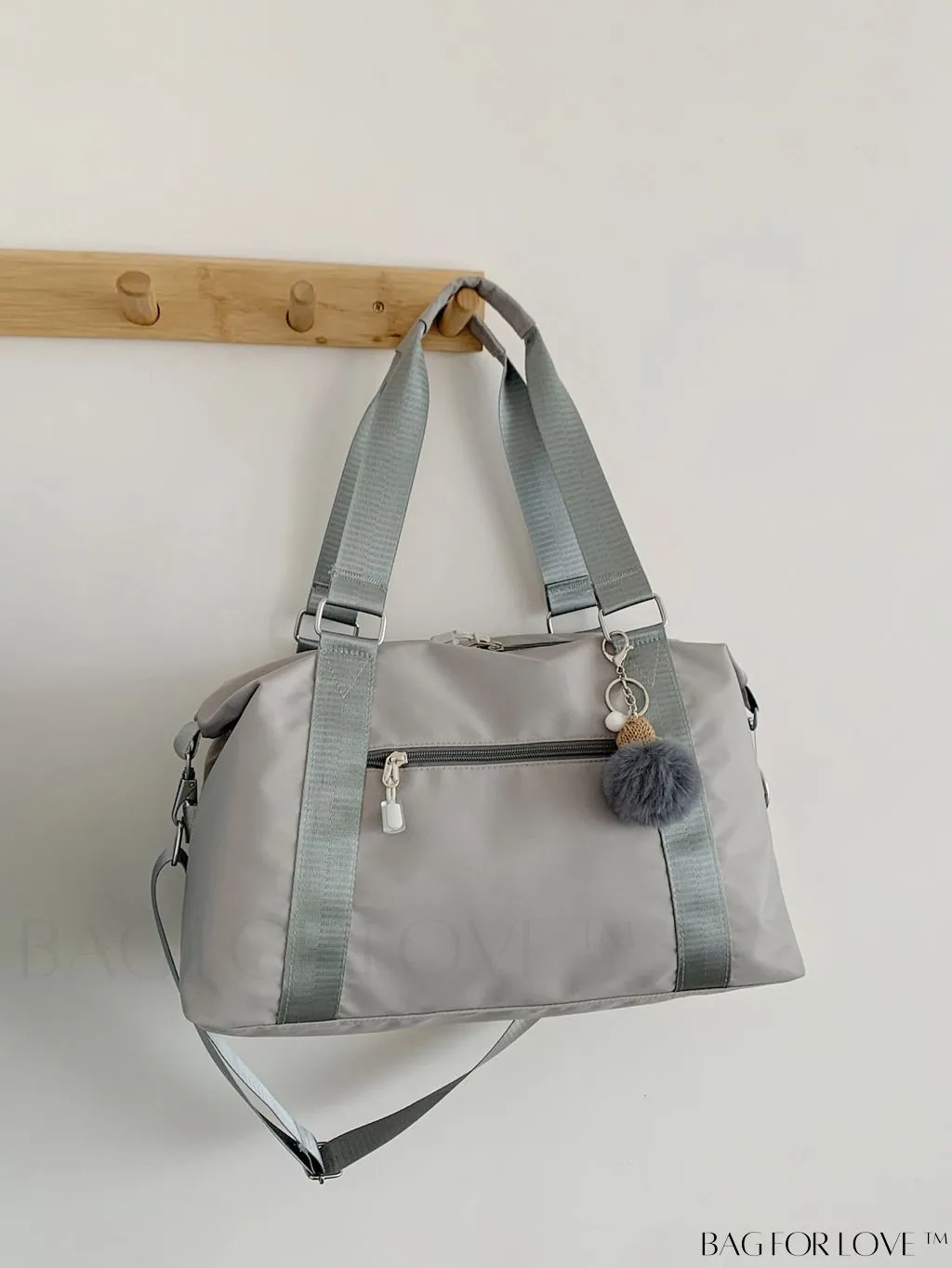 BagForLove - Expansive Pom Pom Embellished Duffle Bag with Ample Storage Capacity