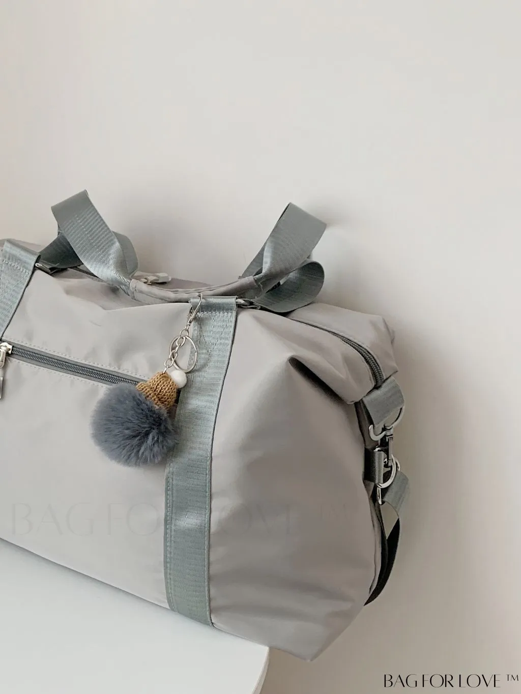 BagForLove - Expansive Pom Pom Embellished Duffle Bag with Ample Storage Capacity