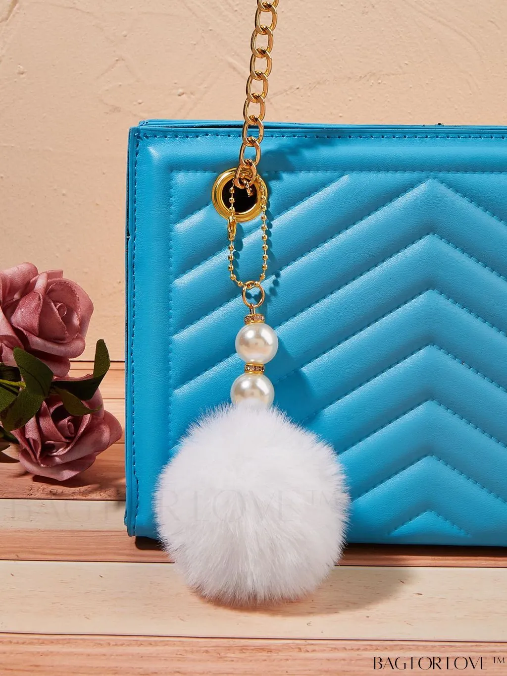 BagForLove - Pearl-Embellished Pom Pom Bag Charm with Sophisticated Design