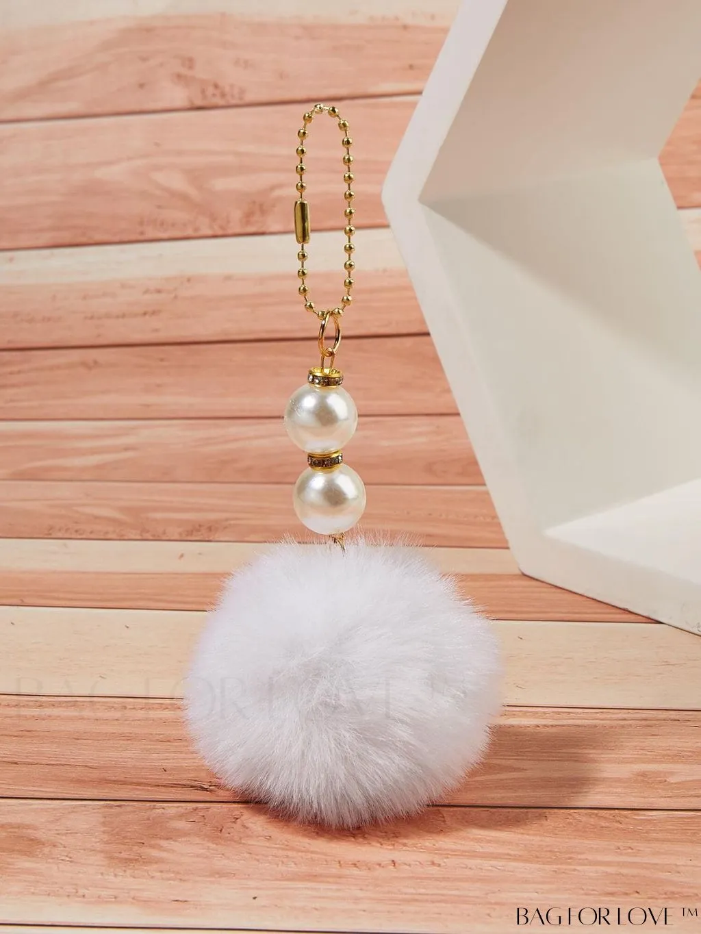BagForLove - Pearl-Embellished Pom Pom Bag Charm with Sophisticated Design