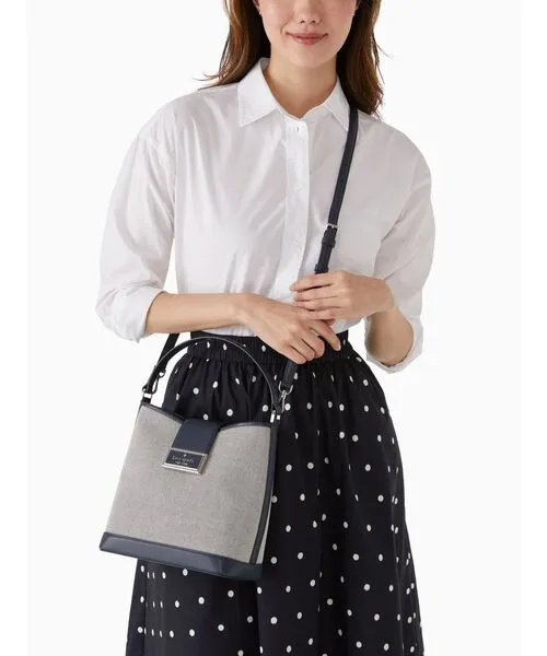 KATE SPADE NY REEGAN CANVAS LEATHER TRIM BUCKET BAG